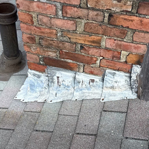 deteriorating chimney flashing and shingles