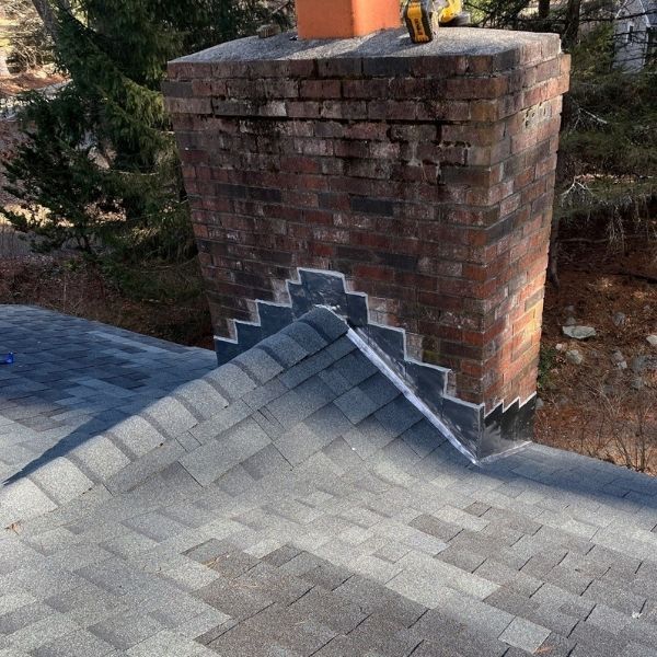 Newly flashed and flashed chimney