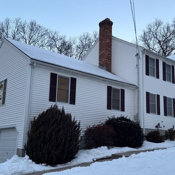 Home with snow covered roof