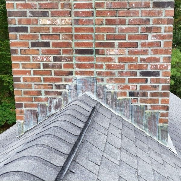 Old chimney with failing flashing