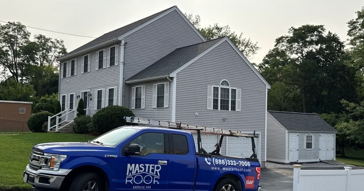Home with a contractor truck in the driveway.
