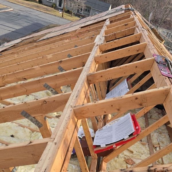 roof with exposed rafters and insulation