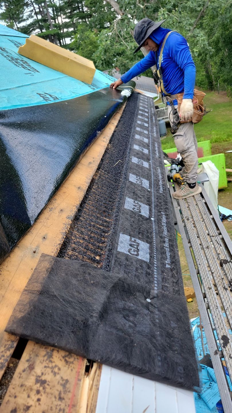 Roof with flashing being installed.