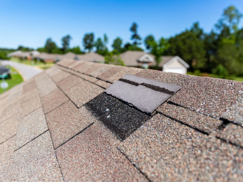 A close up of a roof with a hole in it