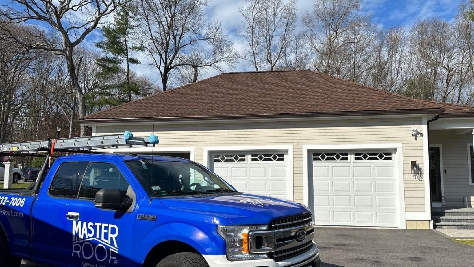 Master Roof Truck in front of a house in MA