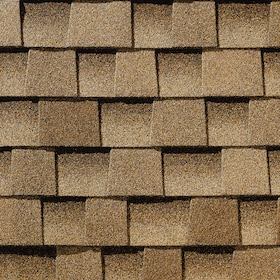 A close up of a roof with shingles on it.