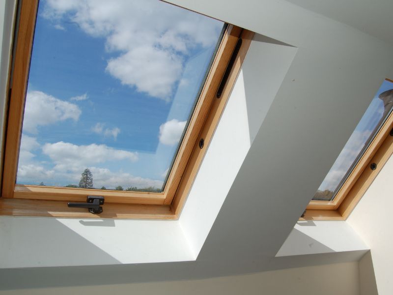 A skylight with a blue sky behind it