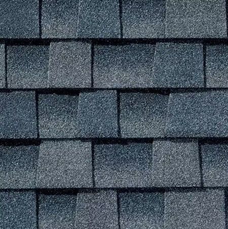 A close up of a roof with shingles on it.
