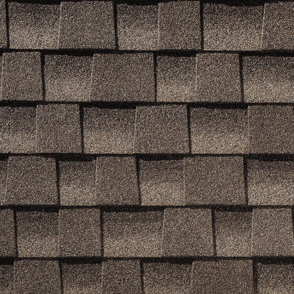 A close up of a roof with shingles on it.