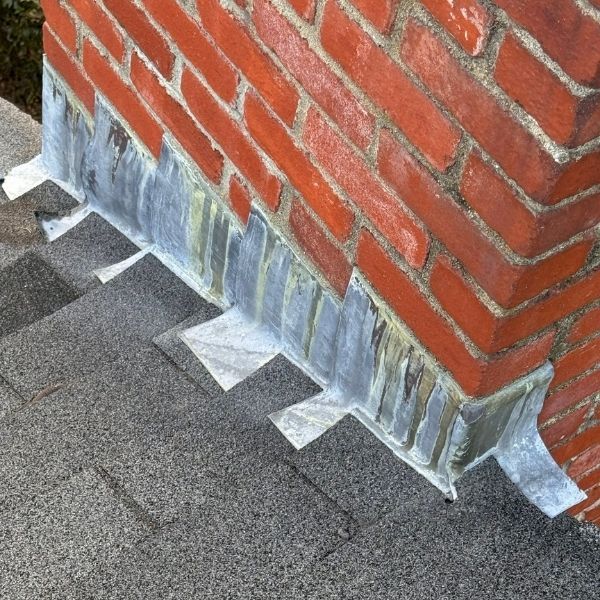 Chimney with work out flashing