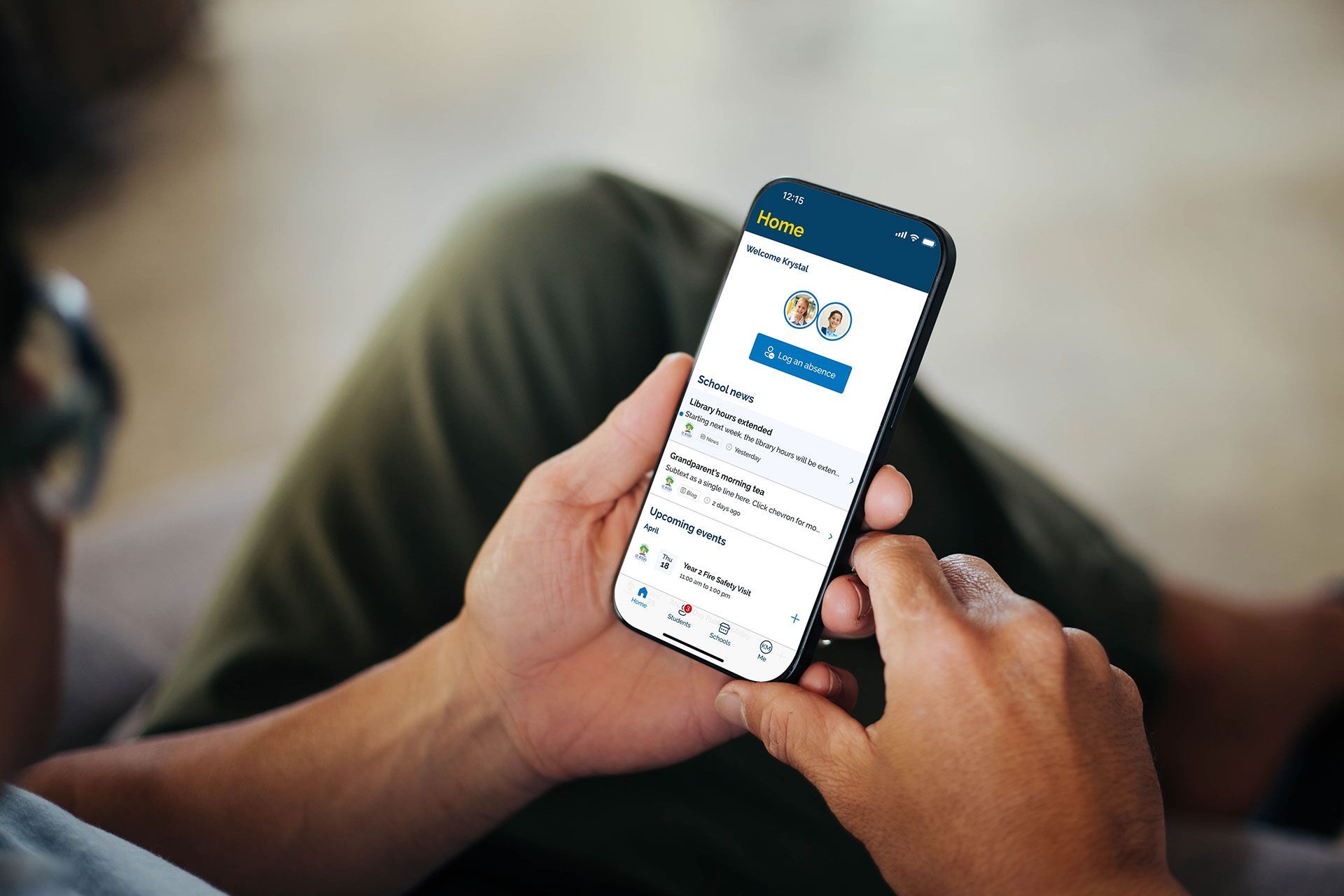 A man is sitting on a couch using a mobile phone to view the BCE Connect app.