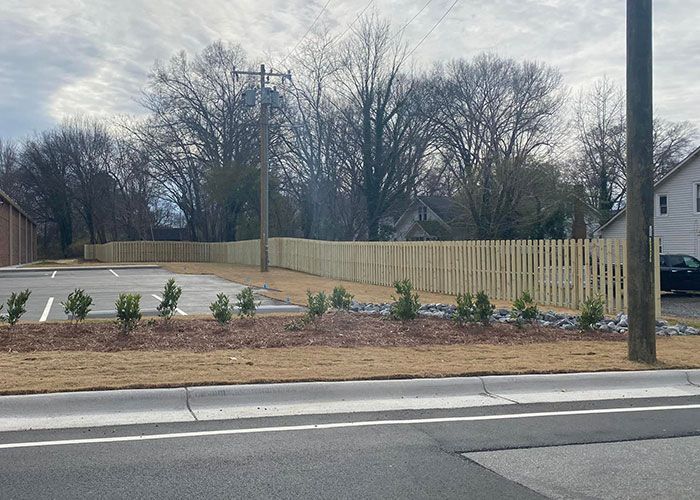 Wooden Fence On An Empty Lot - Thomasville, NC - SP Custom Fencing & Custom Buildings