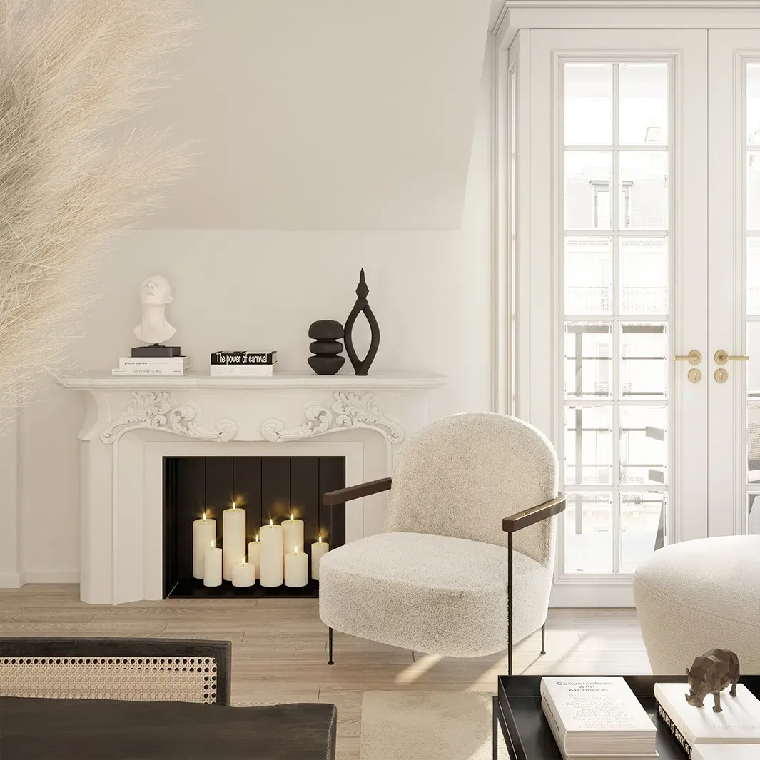 Un living cu semineu , scaun , masa si lumanari.