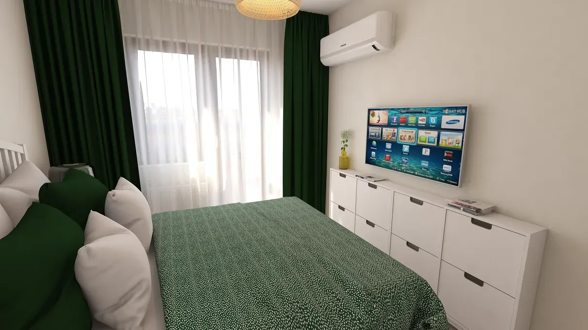 Comodă îngustă pentru spații extra de depozitare și TV suspendat.