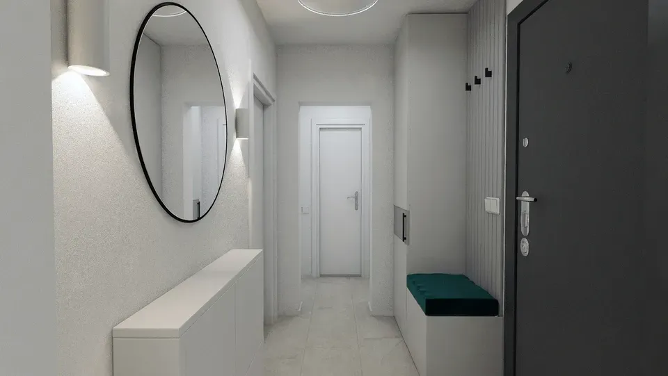 Amenajare interioară apartament hol intrare comodă depozitare încălțăminte și oglindă.