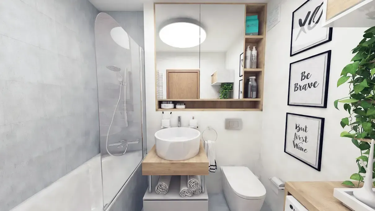 Amenajare interioară baie cu cadă și spațiu dedicat pentru mașina de spălat rufe.