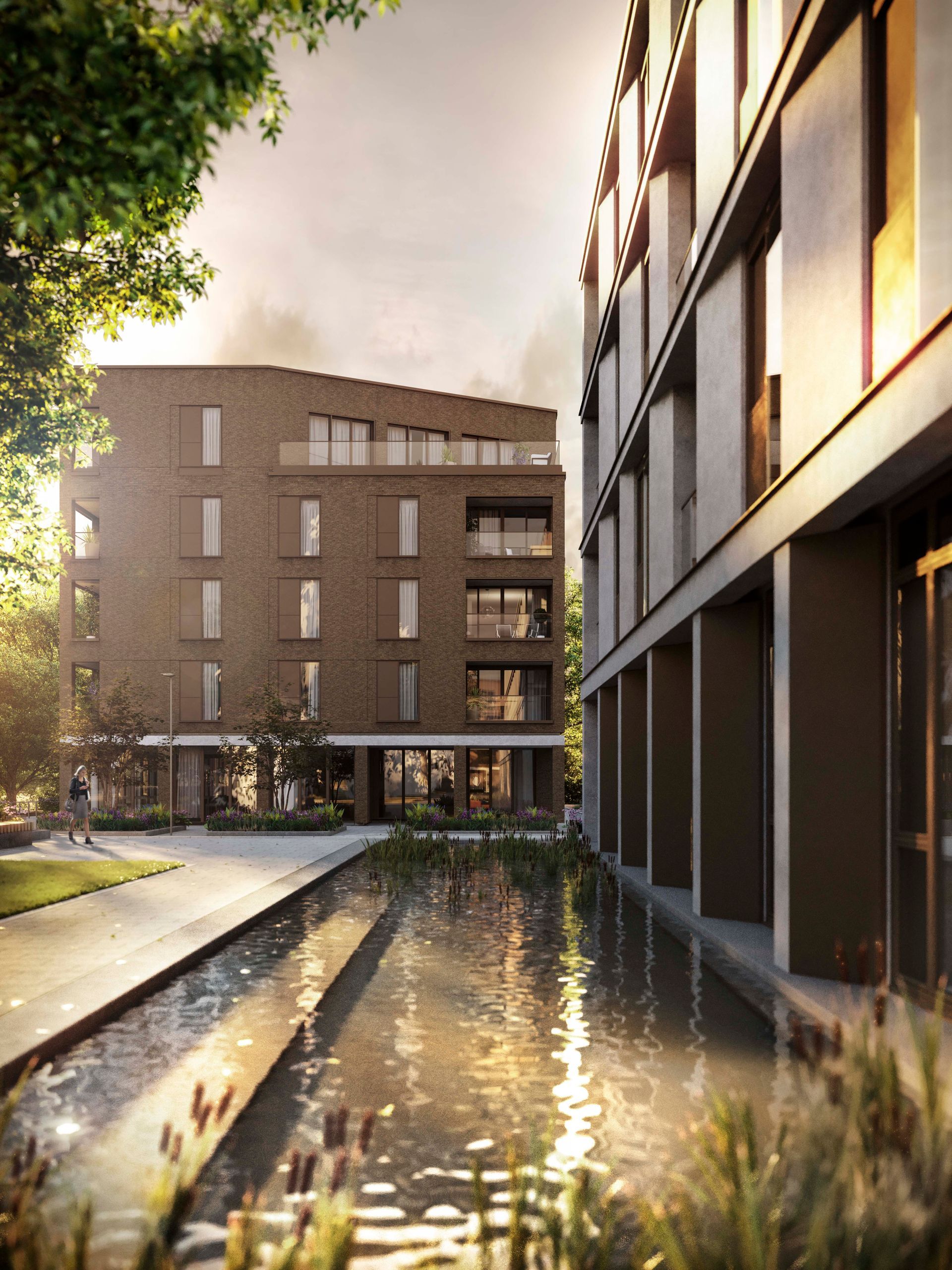 A large building with a pond in front of it at Walton Court.