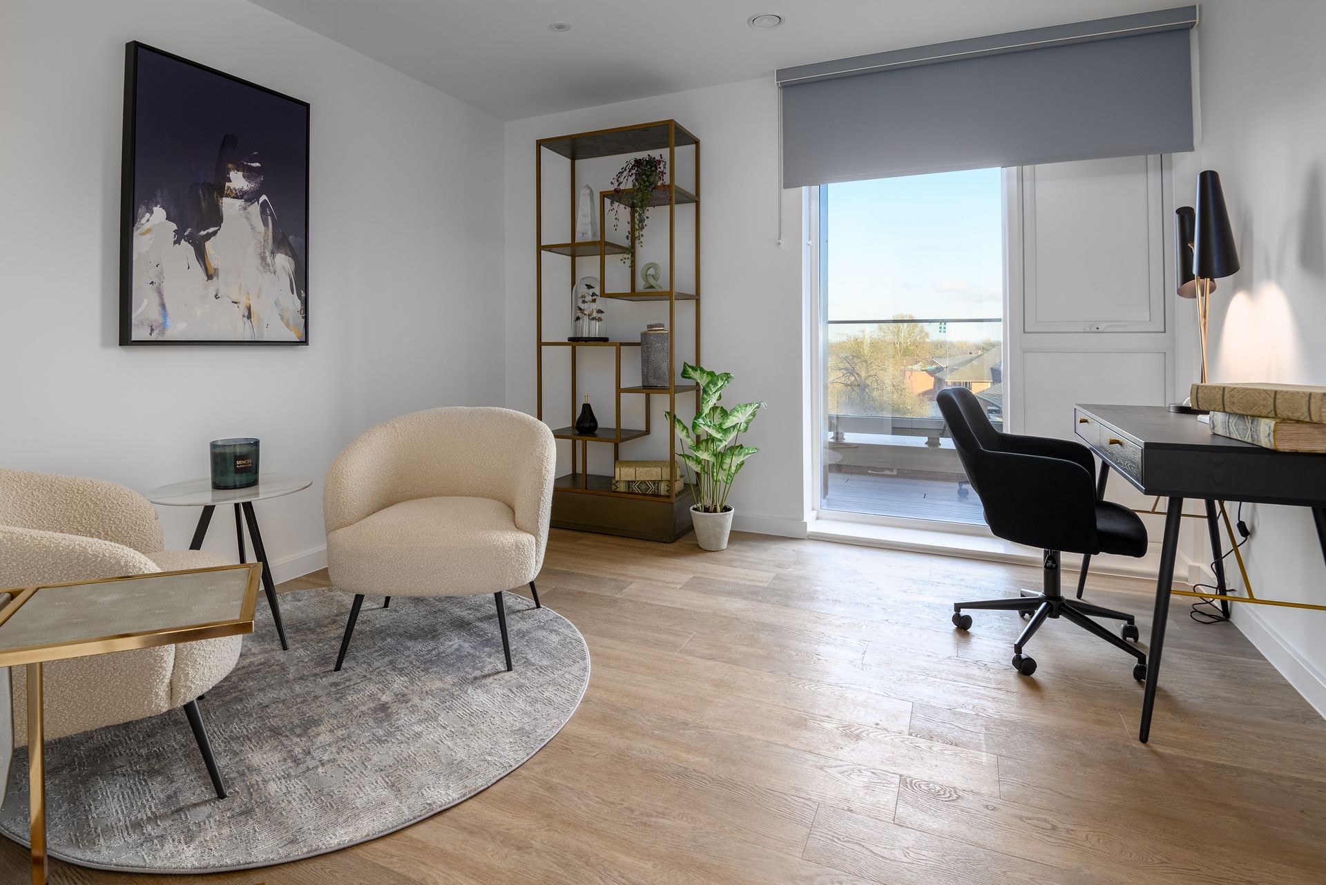 A living room with two chairs , a desk , and a balcony at Walton Court.