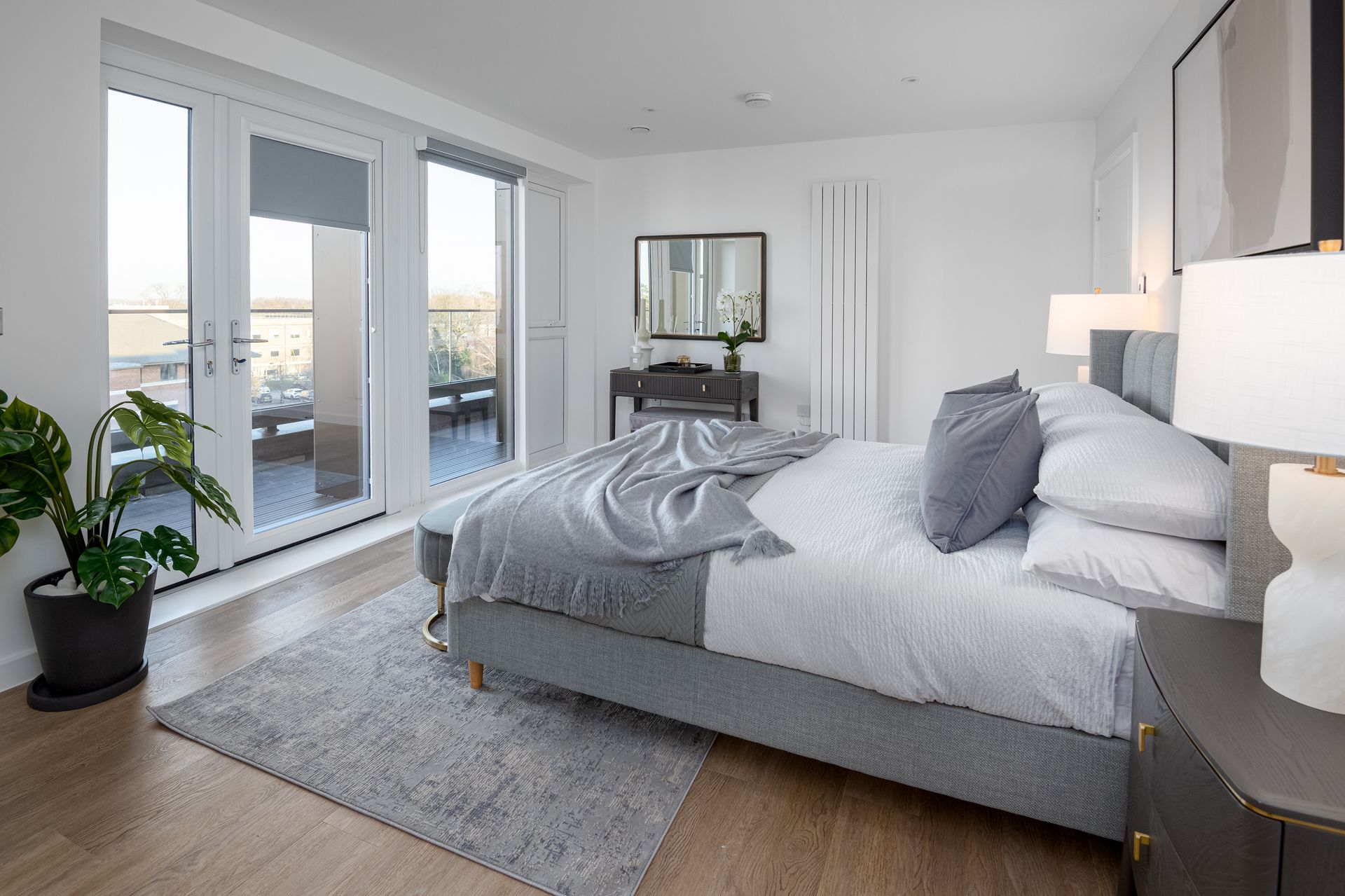 There is a large bed in the middle of the room at Walton Court.