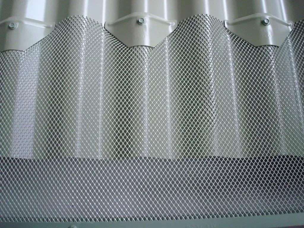 metal roof gutter with mesh installed