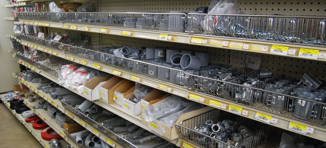 A store shelf filled with lots of different items.