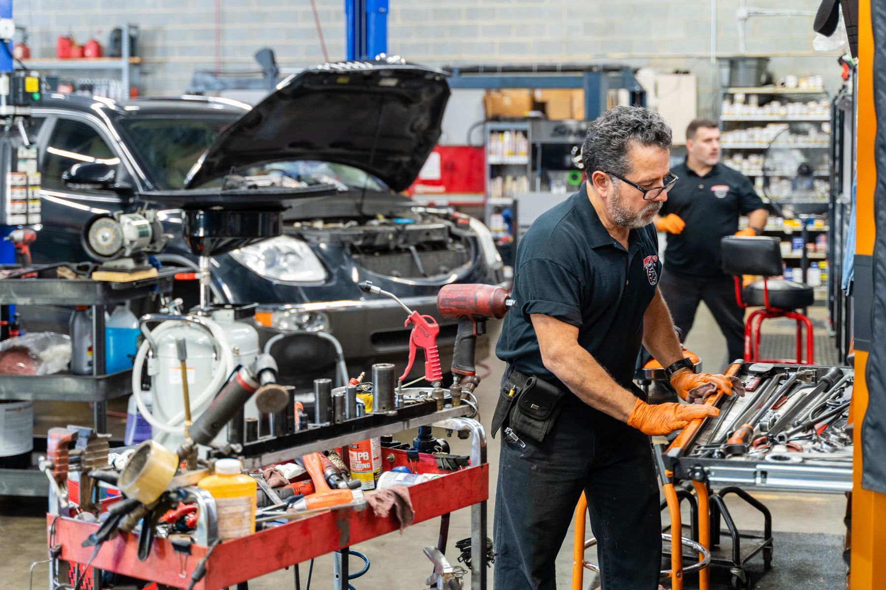 Mechanic Working on a Car in an Auto Repair Shop | Compton's Automotive