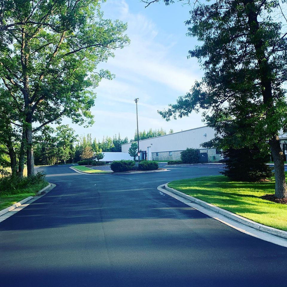 Dependable Asphalt Sealcoating Services to Protect Your Pavement from Harsh Elements