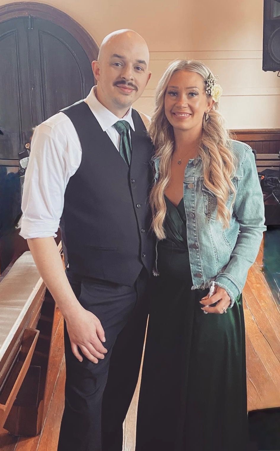 Kyle with Cloud and Fire microphone speaking outdoors.