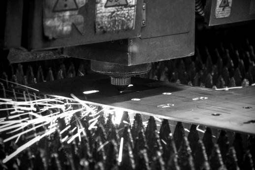 Cutting Machine in Black and White — Denmark, WI — Professional Fabrications