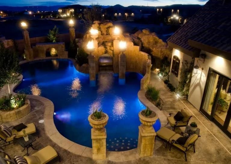 An aerial view of a large swimming pool at night