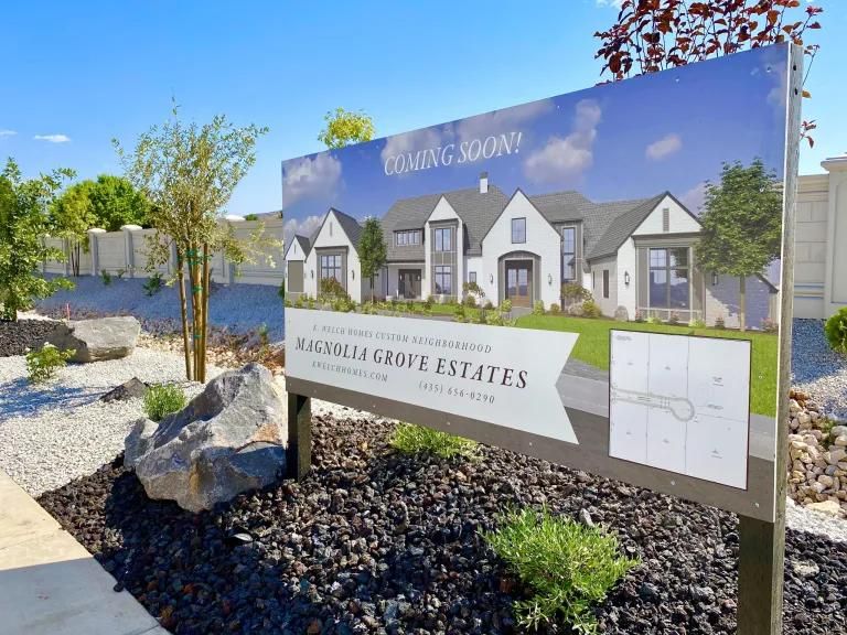 A sign that says ' coming soon ' on it in front of a house