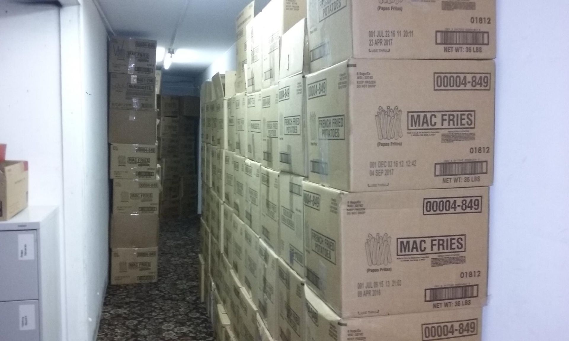 Boxes of mac fries are stacked on top of each other