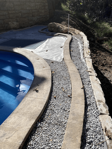 Pool contractor and hardscape for steep yard in louisville