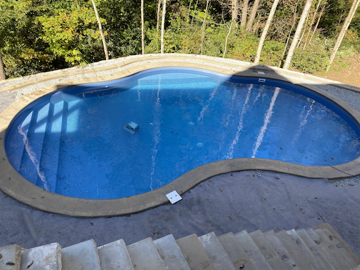 Pool contractor and hardscape for steep yard in louisville