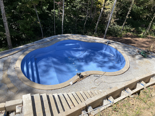 Pool contractor and hardscape for steep yard in louisville