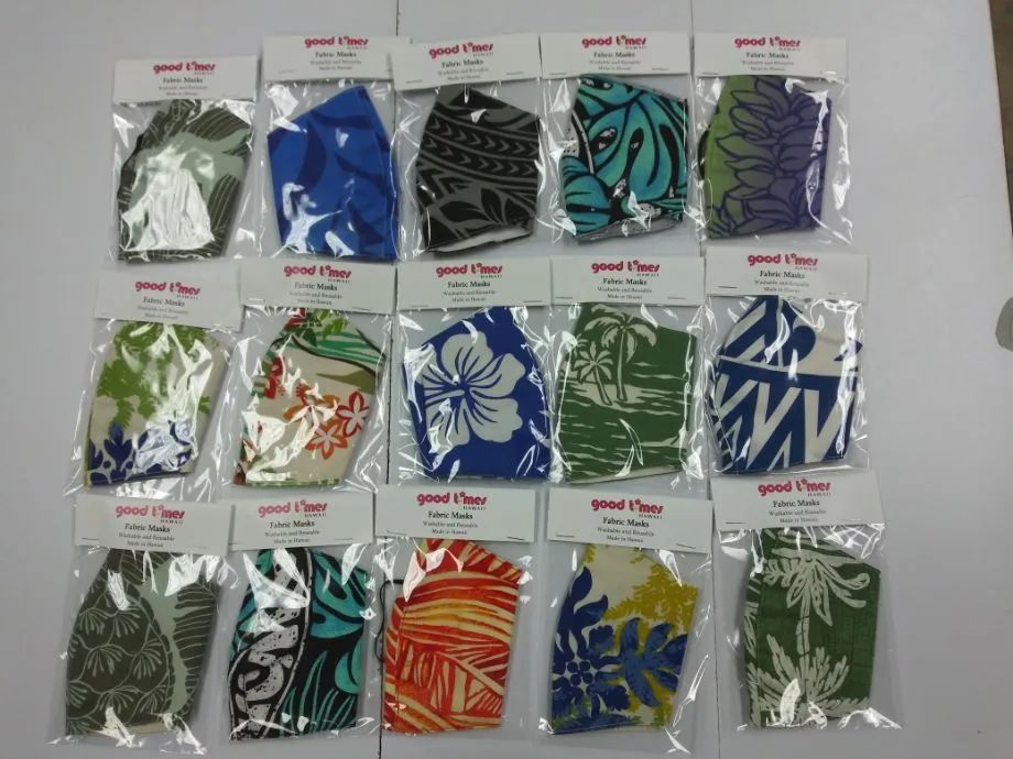 A variety of face masks are sitting on a table.