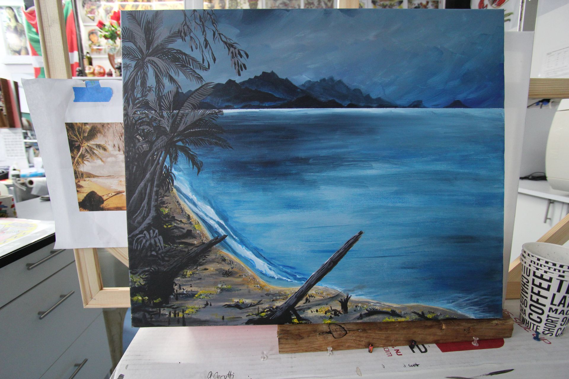 A painting of a beach with palm trees and mountains in the background — Cairns Custom T-Shirts In Cairns City, QLD