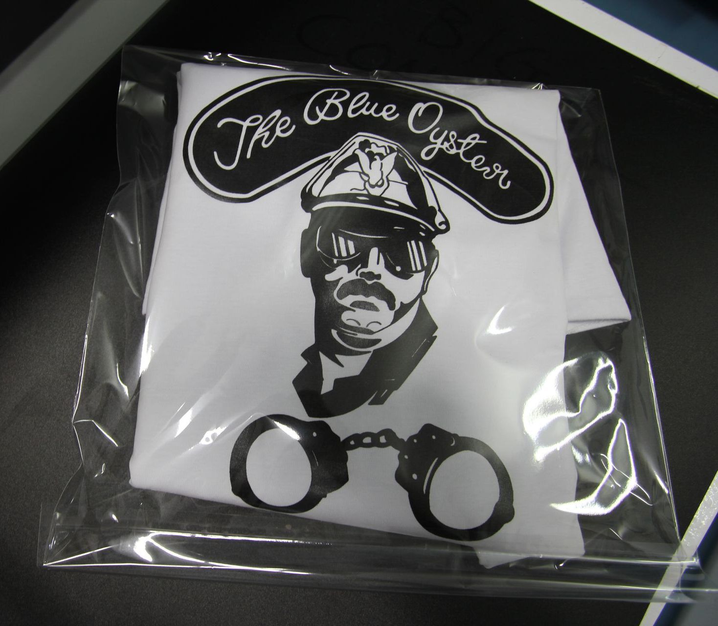 A White Tshirt With A Drawing Of A Man - Cairns Custom T-Shirts In Cairns City, QLD