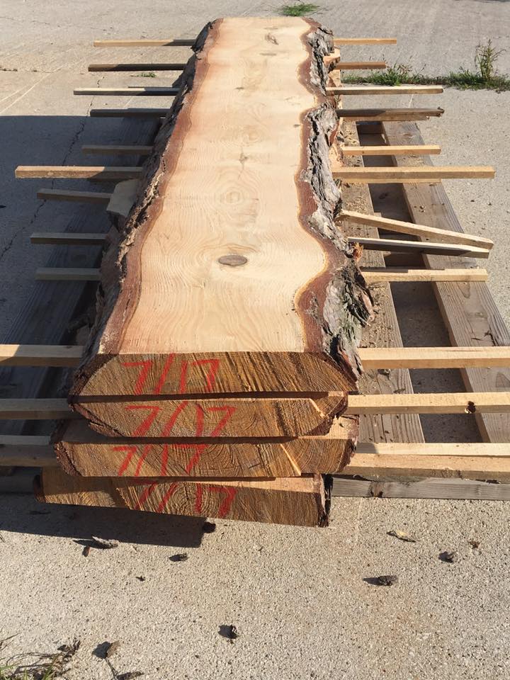 4 slabs of live edge slab cut planks