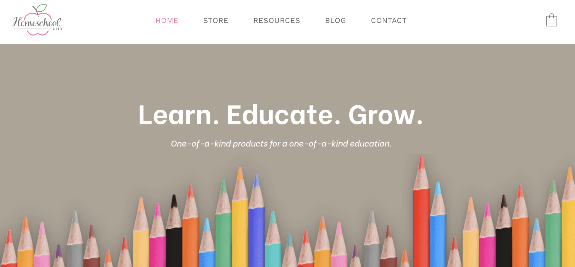 A row of colored pencils on a website that says learn educate grow.