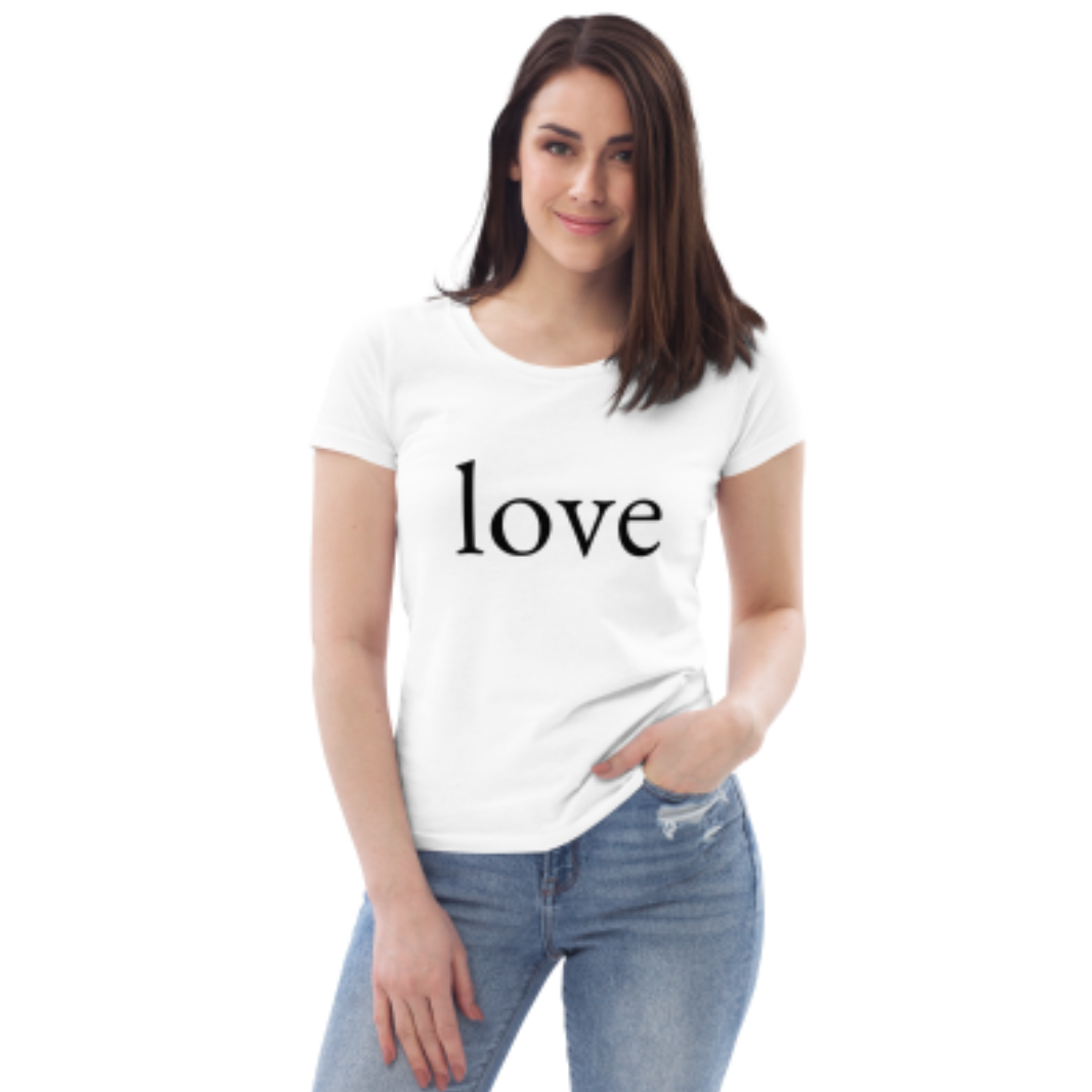A woman wearing a white t-shirt with the word love on it