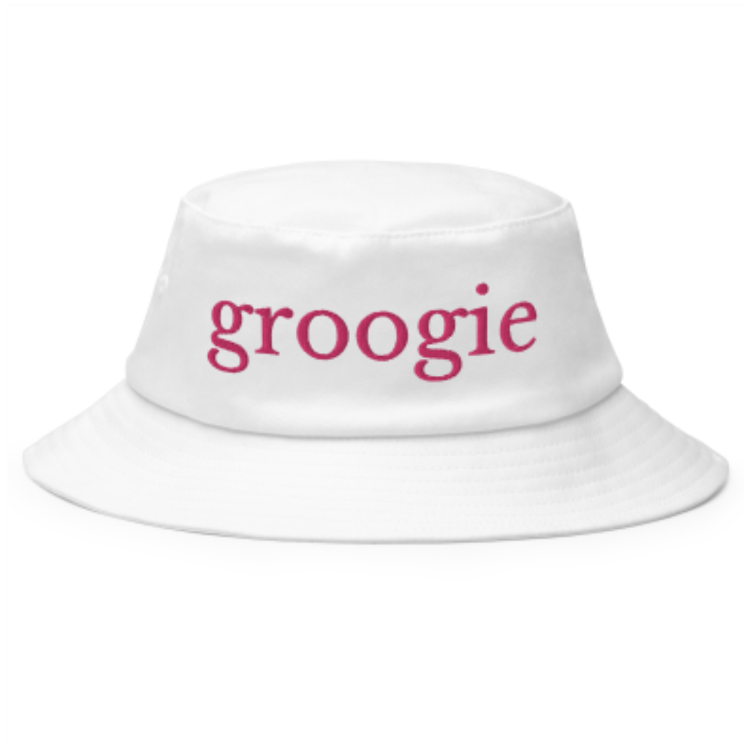 A white bucket hat with the word groogie on it