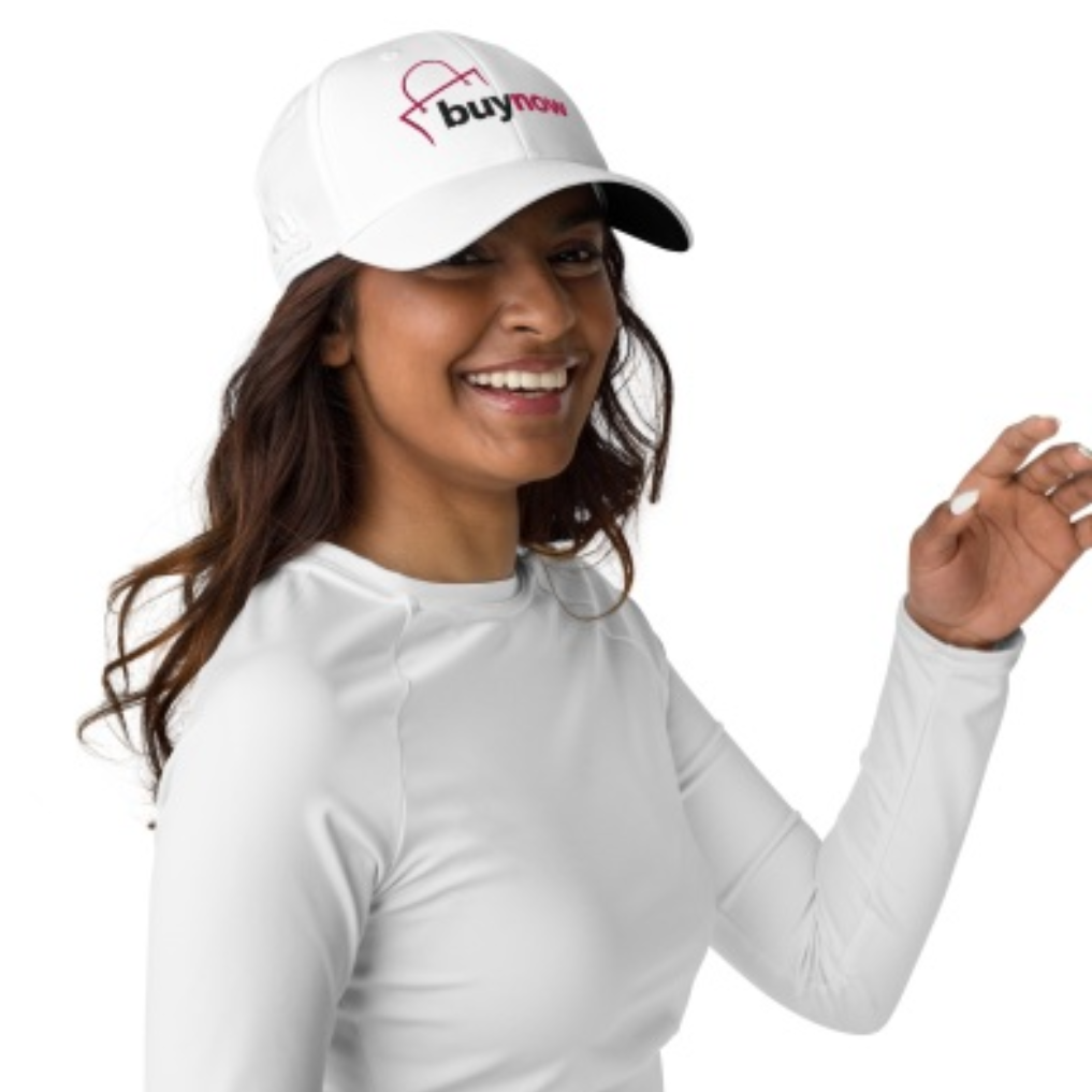 A woman wearing a white hat that says buy now