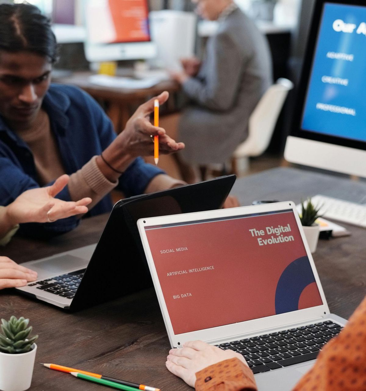 A laptop that says the digital evolution on the screen