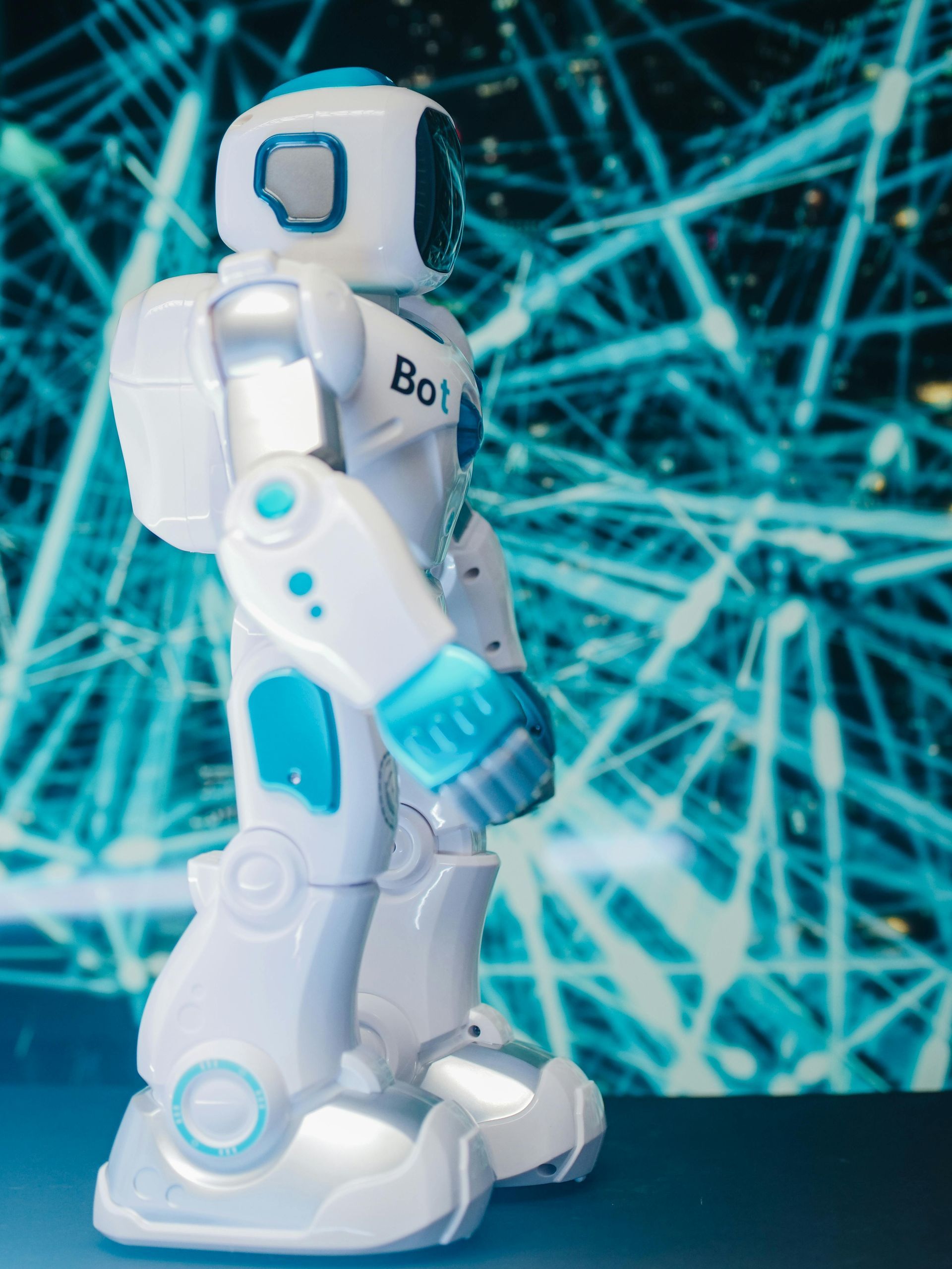 A robot with the word bot on it