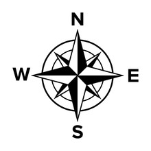 A black and white compass with the letters n , w , e , and s on a white background.