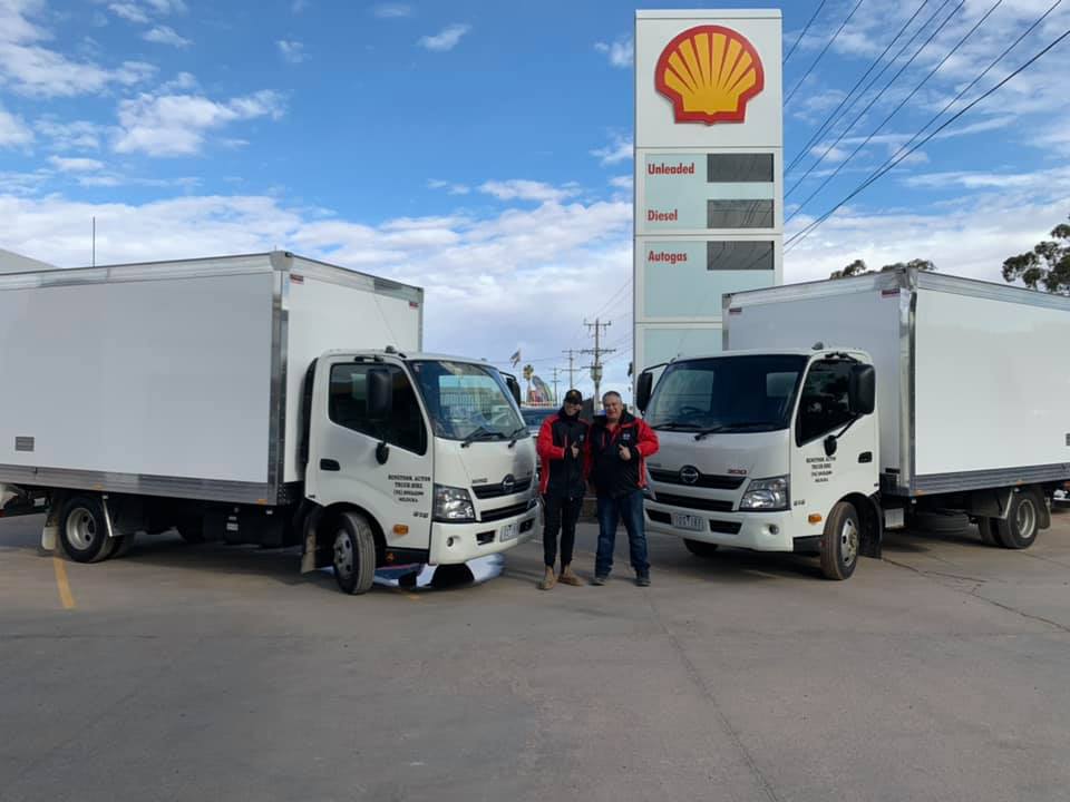 Two white trucks and a two-man | Mildura, VIC | Benetook Automotive & Bus Hire
