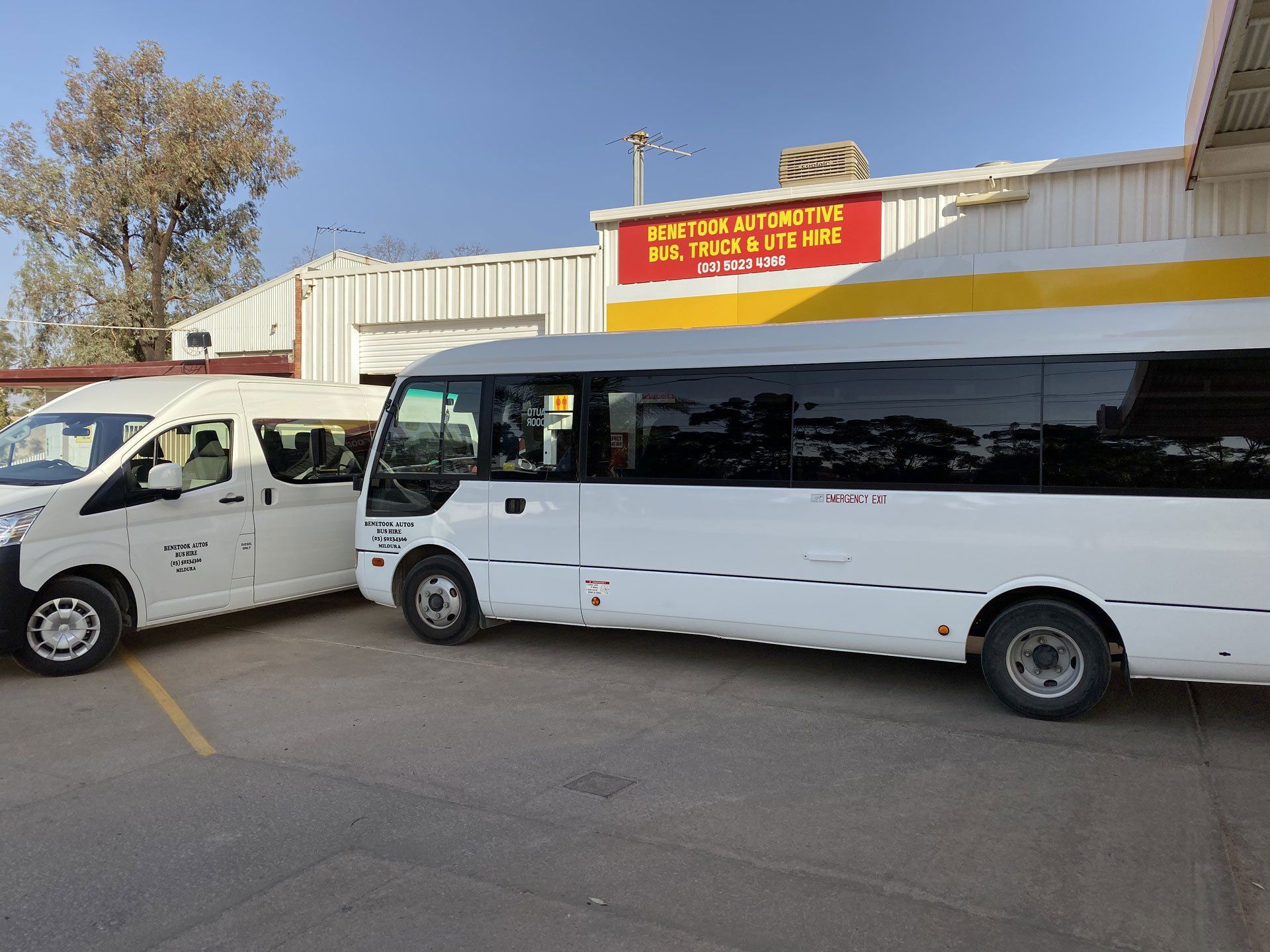 A white bus and van | Mildura, VIC | Benetook Automotive & Bus Hire