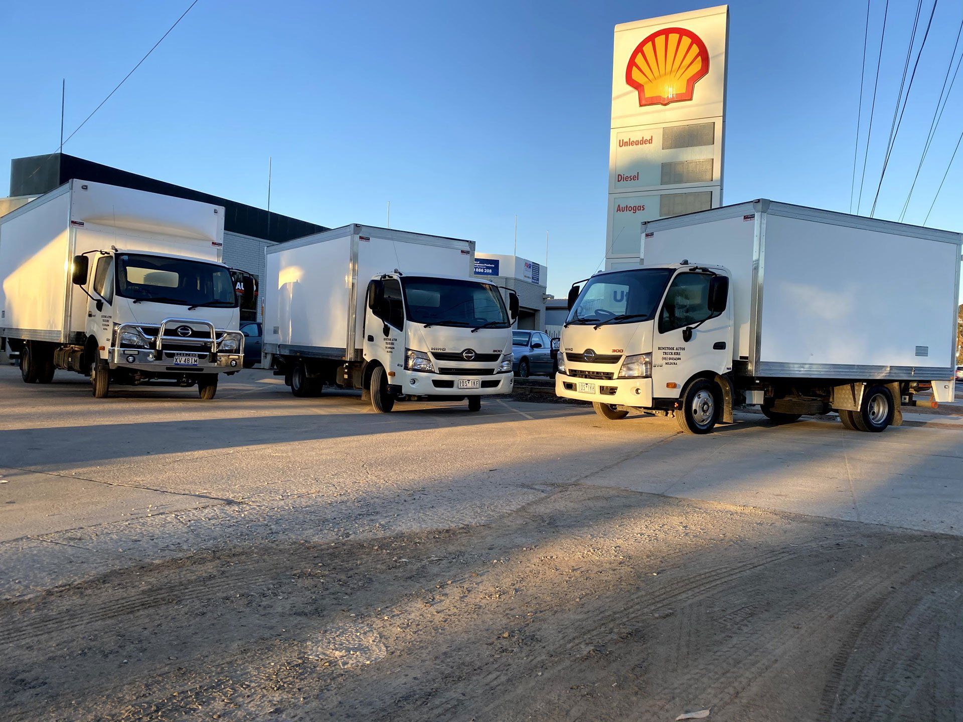 Three white trucks parking | Mildura, VIC | Benetook Automotive & Bus Hire