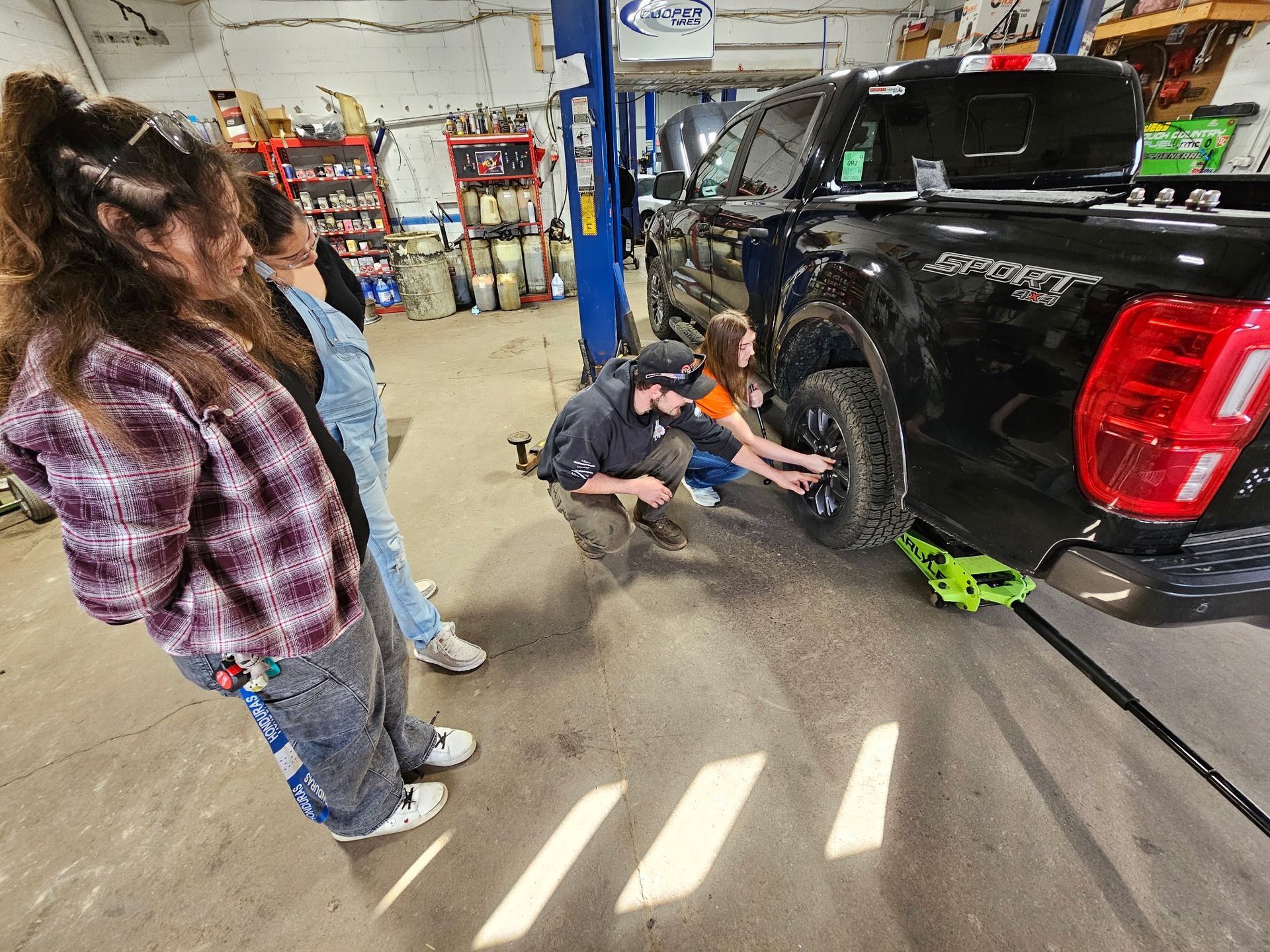 Technician Working on a Vehicle | Tire City Auto Repair